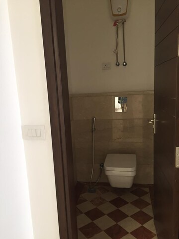 Bathroom in 4 BHK Builder Floor at Maharani Bagh – for Rent