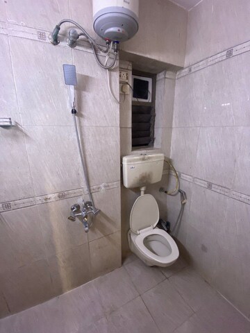 Bathroom in 2 BHK Apartment at Cosmic Heights, Bhakti Park – for Rent