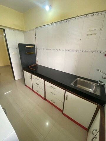 Kitchen in 2 BHK Apartment at Cosmic Heights, Bhakti Park – for Rent