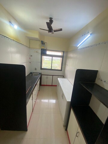 Kitchen in 2 BHK Apartment at Cosmic Heights, Bhakti Park – for Rent