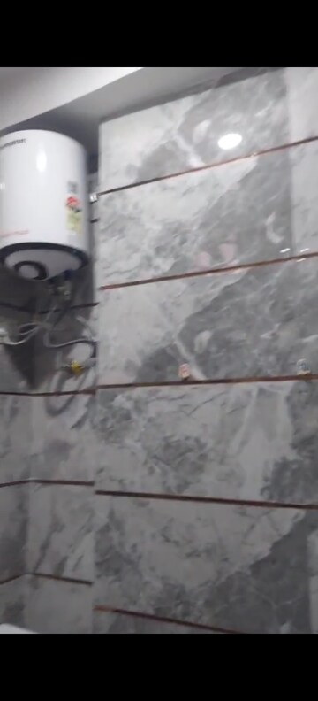 Bathroom in 1 BHK Builder Floor at Dwarka Mor – for Rent