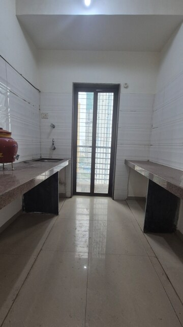 Kitchen in 2 BHK Apartment at Bhatia Esspee Towers, Borivali East – for Rent