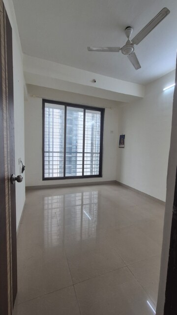 Room in 2 BHK Apartment at Bhatia Esspee Towers, Borivali East – for Rent