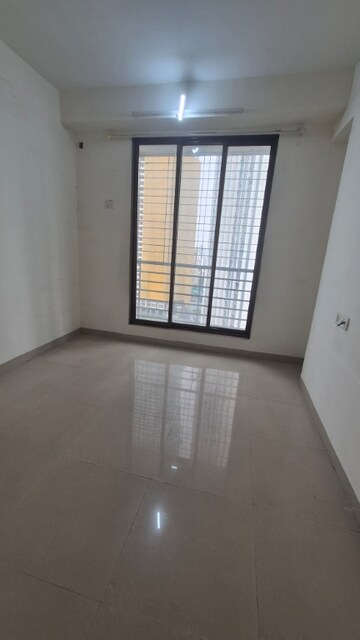 Room in 2 BHK Apartment at Bhatia Esspee Towers, Borivali East – for Rent
