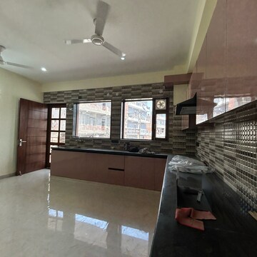 Kitchen in 3 BHK Builder Floor at Ansal Plaza Sector-23, Carterpuri Village – for Rent