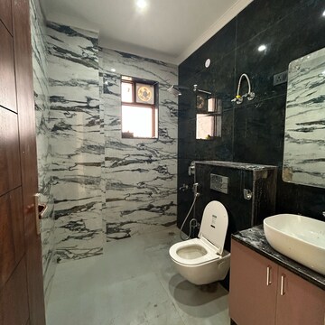 Bathroom in 3 BHK Builder Floor at Ansal Plaza Sector-23, Carterpuri Village – for Rent
