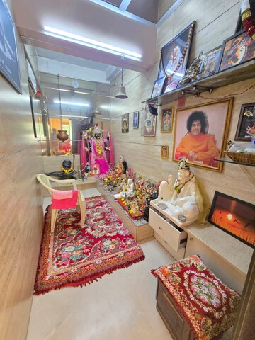 Living Room in 4 BHK Apartment at Joy White House, Santacruz West – for Sale