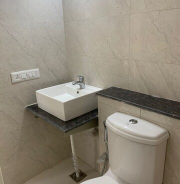 Bathroom in 3 BHK Apartment at International Airport Road – for Rent