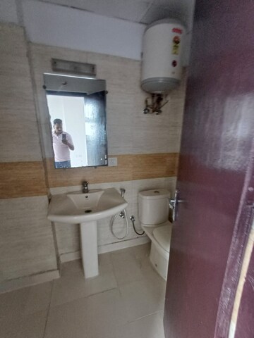 Bathroom in 3 BHK Apartment at Amrapali Platinum, Sector 119 – for Sale