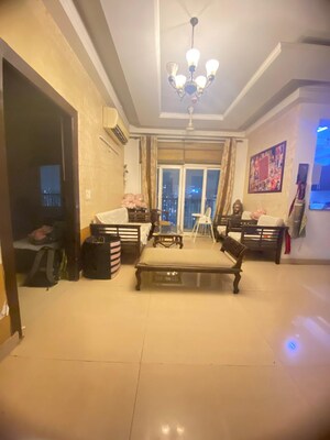Living Room in 3 BHK Apartment at Amrapali Platinum, Sector 119 – for Sale