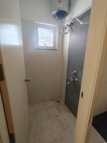 Bathroom in 1 BHK Apartment at Godrej Horizon, Mohammadwadi – for Rent