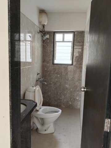 Bathroom in 2 BHK Apartment at Kundan The Landmark, Undri – for Rent