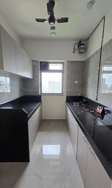 Kitchen in 2 BHK Apartment at Sheth Irene, Malad West – for Rent