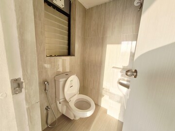 Bathroom in 2 BHK Apartment at Runwal Gardens, Dombivli East – for Rent