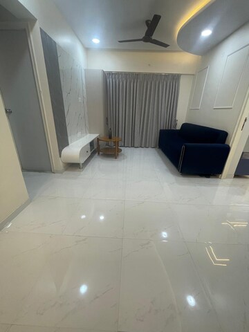 Living Room in 1 BHK Apartment at Runwal Gardens, Dombivli East – for Rent