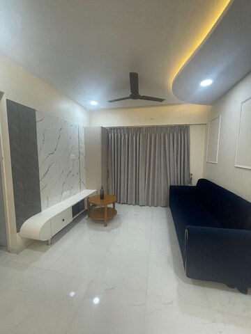 Living Room in 1 BHK Apartment at Runwal Gardens, Dombivli East – for Rent