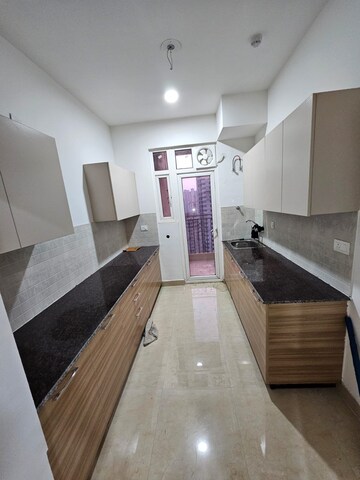 Kitchen in 3 BHK Apartment at ATS Homekraft Pious Hideaways, Sector 150 – for Sale