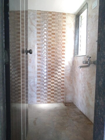 Bathroom in 1 BHK Apartment at SS Sky Heights, Nalasopara West – for Rent