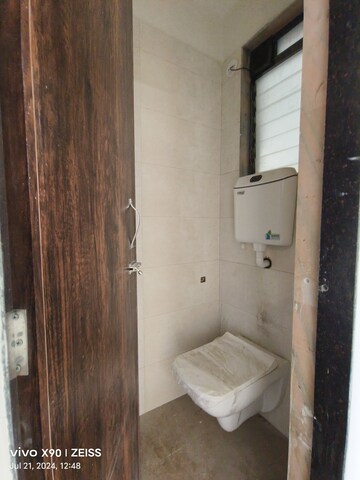 Bathroom in 2 BHK Apartment at Dombivli East – for Sale