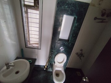 Bathroom in 2 BHK Apartment at Lodha Iris, Majiwada – for Rent