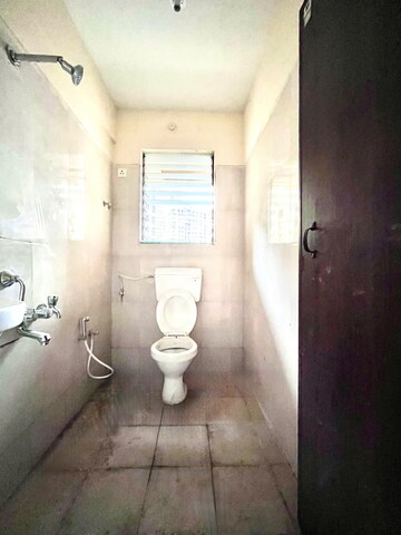Bathroom in 1 BHK Apartment at Paradigm Zenith Pushpanjali Residency Phase III, Ghodbunder Road – for Sale