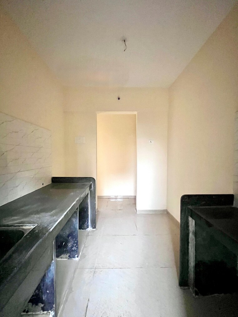 Kitchen, paradigm-zenith-pushpanjali-residency-phase-iii 1 Bedroom 530 Sq.Ft. Apartment In Ghodbunder Road Thane 9187242