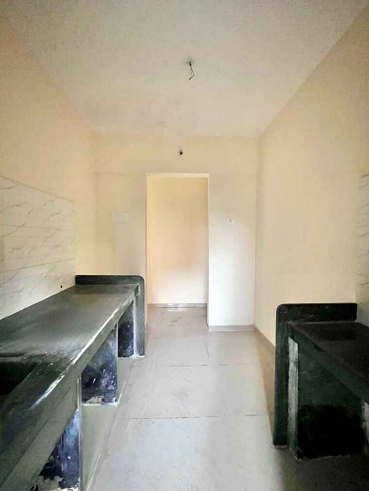 Kitchen, paradigm-zenith-pushpanjali-residency-phase-iii 1 Bedroom 530 Sq.Ft. Apartment In Ghodbunder Road Thane 9187242