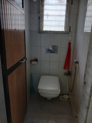 Bathroom in 1 BHK Apartment at Akal CHS, Andheri East – for Rent