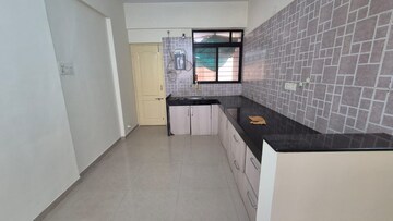 Kitchen in 3 BHK Apartment at Kolte Patil Margosa Heights, Mohammadwadi – for Rent