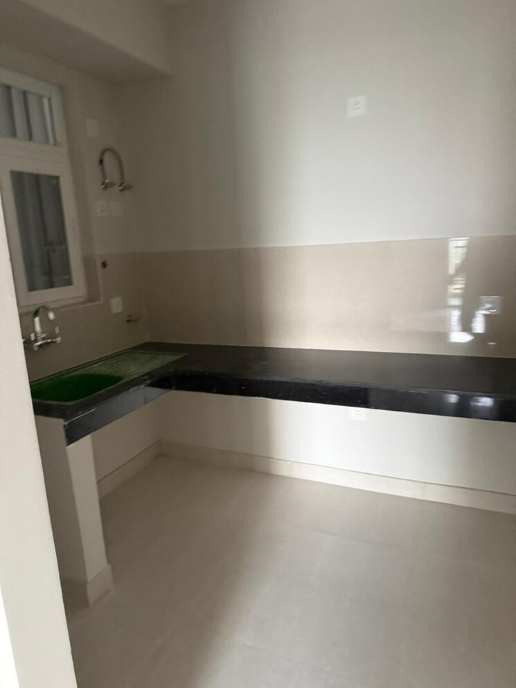 Kitchen, eldeco-live-by-the-greens 3 Bedroom 1404 Sq.Ft. Apartment In Sector 150 Noida 9187341