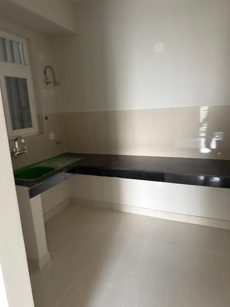 Kitchen, eldeco-live-by-the-greens 3 Bedroom 1404 Sq.Ft. Apartment In Sector 150 Noida 9187341