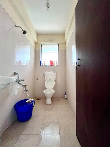 Bathroom in 1 BHK Apartment at Paradigm Zenith Pushpanjali Residency Phase III, Ghodbunder Road – for Rent