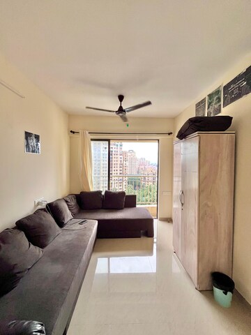 Living Room in 1 BHK Apartment at Paradigm Zenith Pushpanjali Residency Phase III, Ghodbunder Road – for Rent