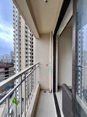 Balcony in 1 BHK Apartment at Paradigm Zenith Pushpanjali Residency Phase III, Ghodbunder Road – for Rent