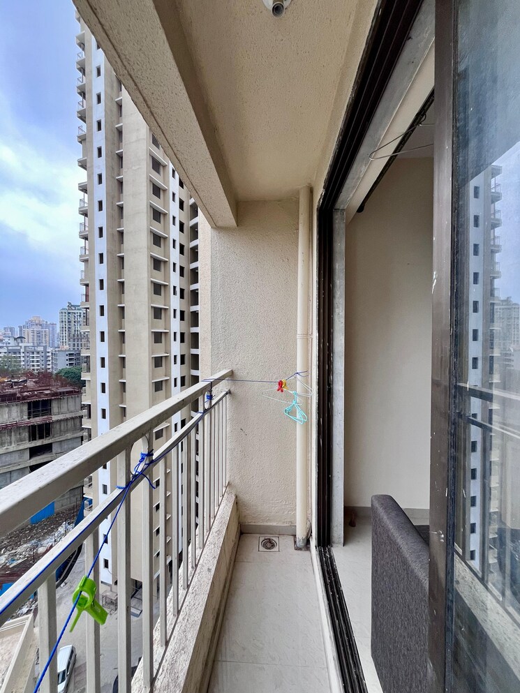 Balcony, paradigm-zenith-pushpanjali-residency-phase-iii 1 Bedroom 550 Sq.Ft. Apartment In Ghodbunder Road Thane 9187345