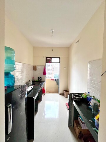 Team Area in 1 BHK Apartment at Paradigm Zenith Pushpanjali Residency Phase III, Ghodbunder Road – for Rent