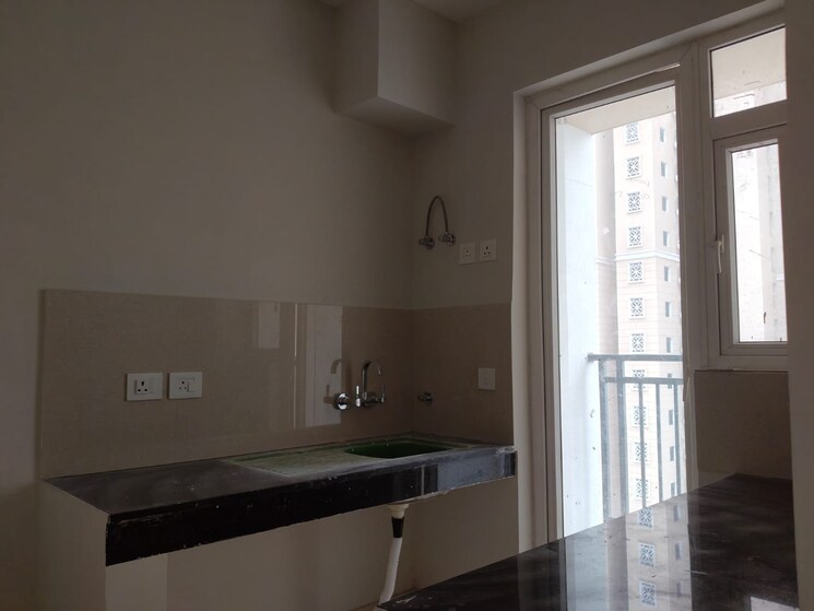 Kitchen, eldeco-live-by-the-greens 2 Bedroom 1137 Sq.Ft. Apartment In Sector 150 Noida 9187370