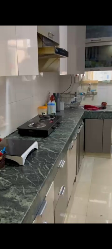 Kitchen in 3 BHK Apartment at Adore Happy Homes Grand, Sector 85 – for Rent