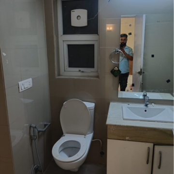 Bathroom in 2 BHK Apartment at Emaar MGF The Palm Drive Studios, Sector 66 – for Rent