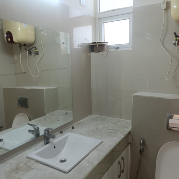 Bathroom in 2 BHK Apartment at Emaar MGF The Palm Drive Studios, Sector 66 – for Rent
