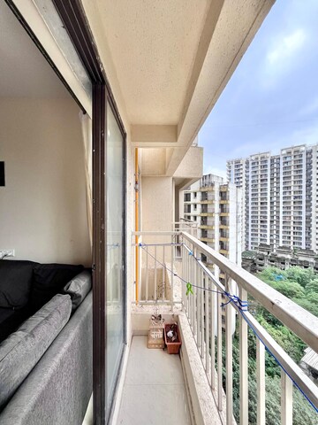 Balcony in 1 BHK Apartment at Paradigm Zenith Pushpanjali Residency Phase III, Ghodbunder Road – for Rent