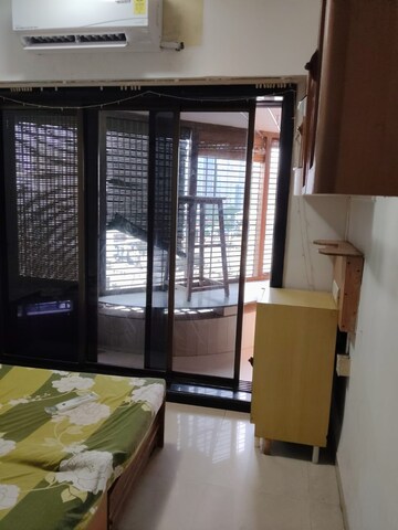 Living Room in 2 BHK Apartment at Maharaja Retreat CHS, Goregaon East – for Rent