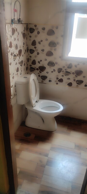 Bathroom in 2.5 BHK Builder Floor at Greenwood Enclave, Wave City – for Rent