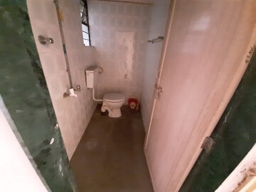 Bathroom in 2 BHK Apartment at Amey River View , Anand Nagar – for Rent