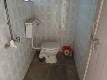 Bathroom in 2 BHK Apartment at Amey River View , Anand Nagar – for Rent