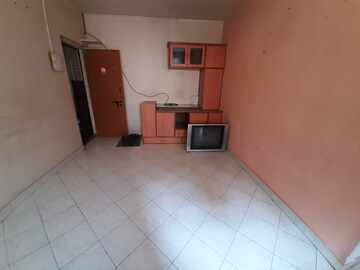Bathroom in 2 BHK Apartment at Amey River View , Anand Nagar – for Rent
