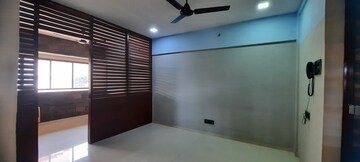 Living Room in 1 BHK Apartment at Queens View, Juhu – for Rent