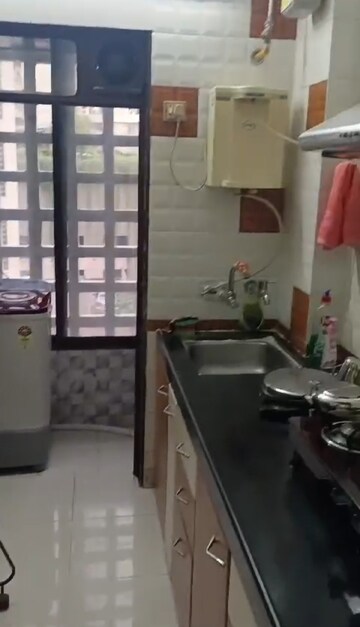 Kitchen in 1 BHK Apartment at Kshitij CHS, Goregaon East – for Rent