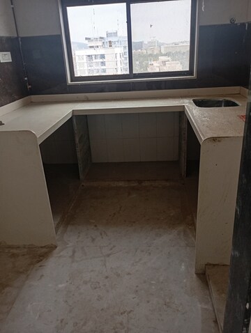 Kitchen in 2 BHK Apartment at Aakash Srishthi, Andheri East – for Sale