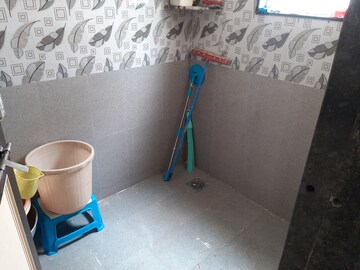 Bathroom in 2 BHK Apartment at Kudale Patil Park CHS, Hingne Khurd – for Sale